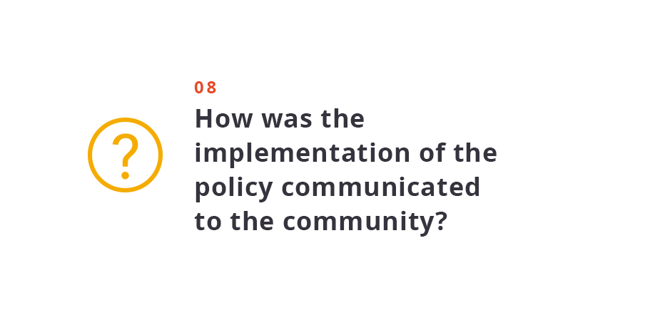 How was the implementation of the policy communicated to the community?